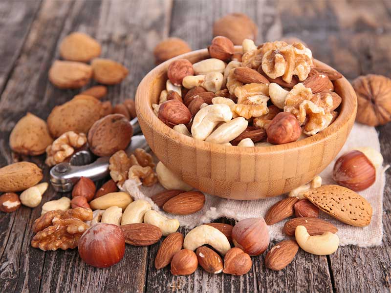 Eine Handvoll Nüsse liefern wichtige Omega-3-Fettsäuren und Proteine. Aber sie sind auch echte Kalorienbomben.